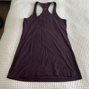 Maroon racer back lulu lemon tank. Size 8.